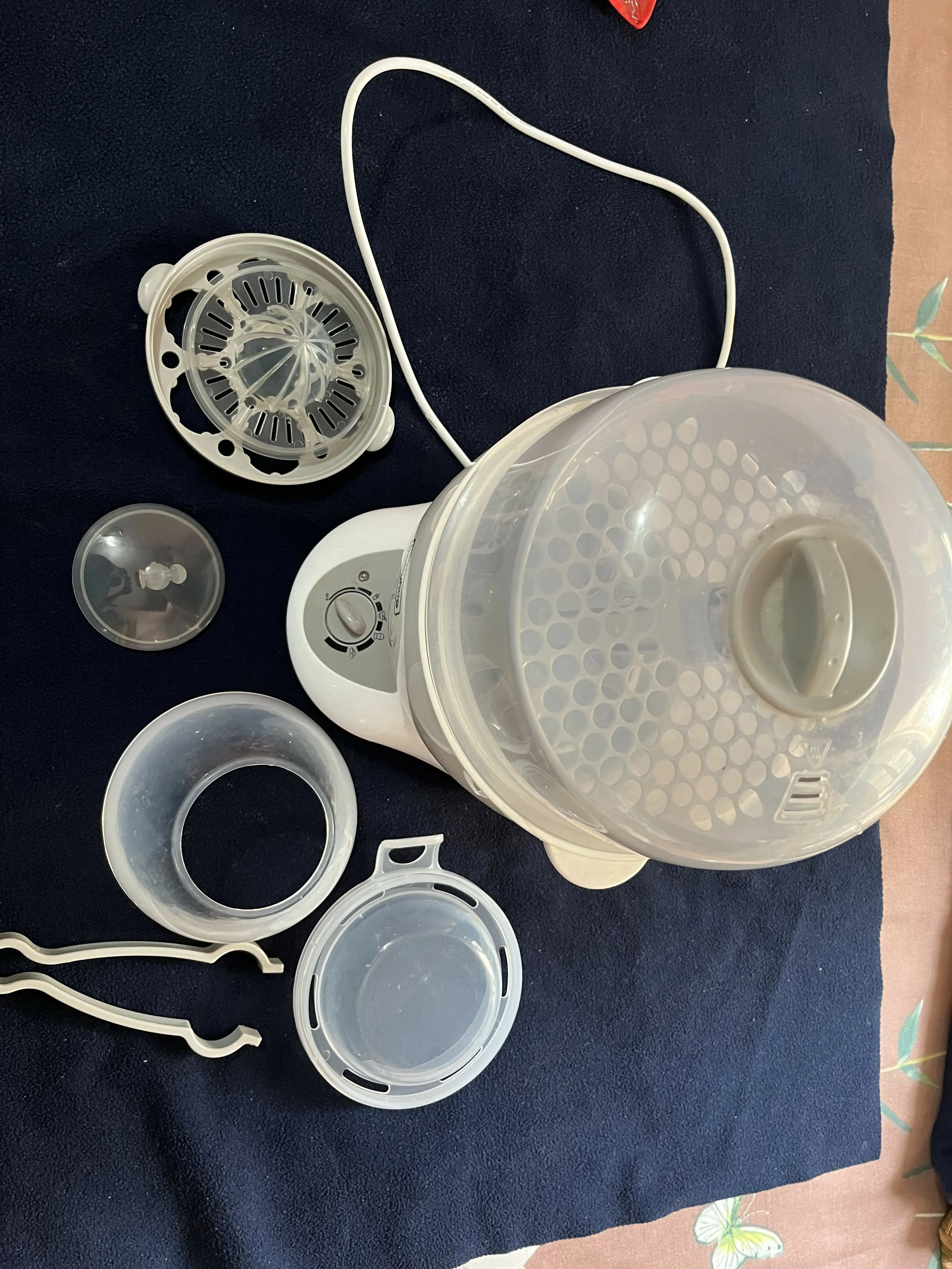 BABYHUG 6-in-1 bottle sterilizer cum warmer